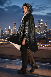 Blitzed Micro Fleece Cloak — lifestyle — rooftop side-profile movement