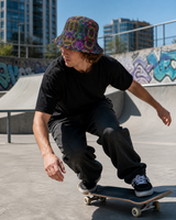 Prismatic Grid reversible bucket hat - worn skatepark