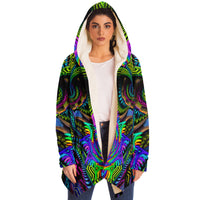 Primordial Micro Fleece Cloak, Hooded Wearable Art, Psychedelic Festival Layer — wearer-right three-quarter — hood lowered
