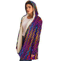 Rainbow Healing Micro Fleece Cloak, Hooded Wearable Art, Psychedelic Festival Layer — wearer-right three-quarter — hood lowered