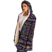 Rainbow Tribe Micro Fleece Cloak, Hooded Wearable Art, Psychedelic Festival Layer — wearer-right three-quarter — hood lowered